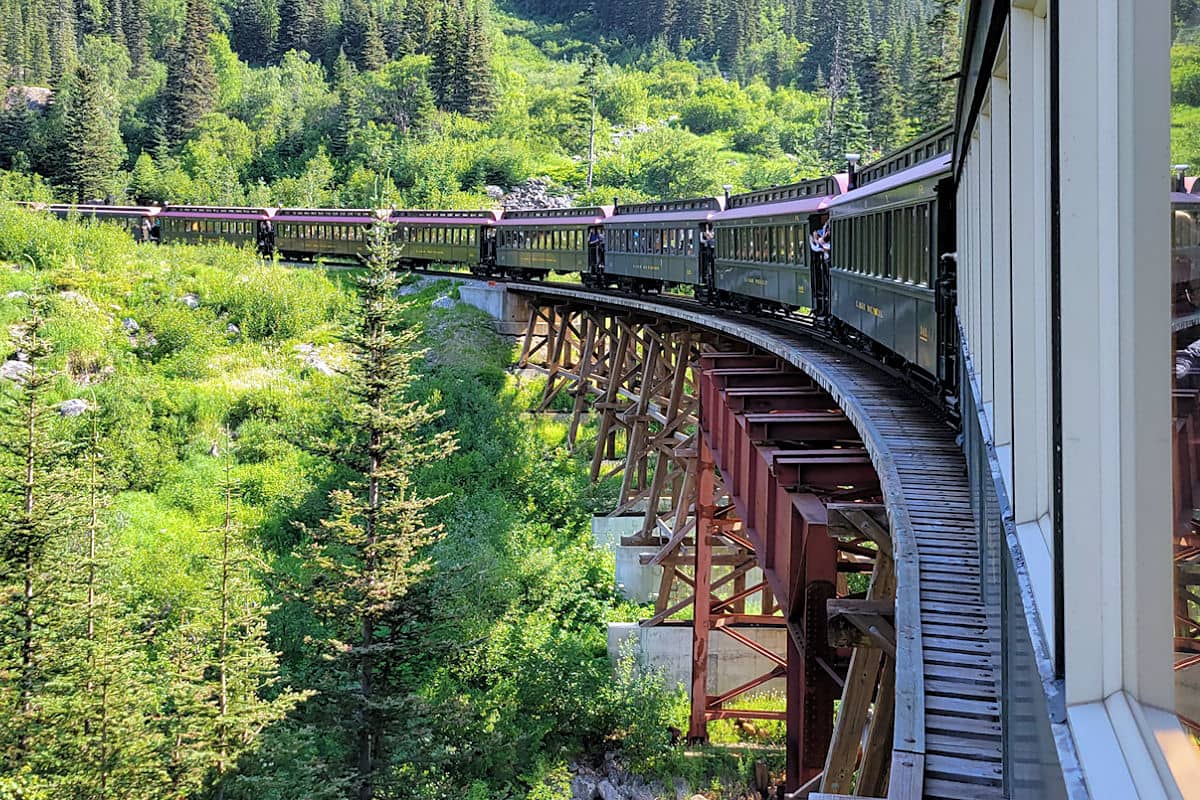 Riding the White Pass Railroad over a wooden trestle