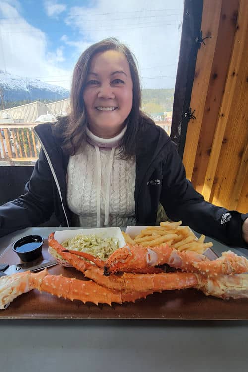 Enjoying a king crab meal at Woadie's in Skagway, Alaska