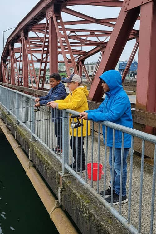 Kids fishing on Stedman Bridge in Ketchikan